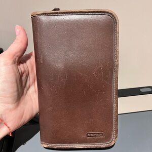 Coach -vintage brown leather zip around travel wallet